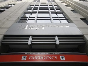In this Nov. 16, 2007, file photo, the emergency entrance at Northwestern Memorial Hospital in Chicago is seen. A Maryland man died from a transplanted, rabies-infected kidney from a donor who wasn’t known to have the disease. Federal officials said Friday. The rare death prompted treatment of three others who got organs from the same donor, one in a transplant operation at Northwestern. The Chicago hospital confirmed the Illinois transplant was performed there and that its doctors are administering the rabies treatment to that recipient. (AP Photo/Charles Rex Arbogast, File)