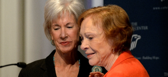 Former First Lady Rosalynn Carter, right, thanks Department of Health and Human Services Secretary Kathleen Sebelius, after Sebelius announced easier access to mental health care during the 29th annual mental health policy symposium at the Carter Center on Friday, Nov. 8, 2013, in Atlanta. [David Tulis, for The Associated Press]