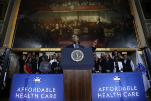 In this Oct. 30, 2013 file photo, President Barack Obama speaks at Boston's historic Faneuil Hall about the federal health care law. [CREDIT: Charles Dharapak, for The Associate Press]