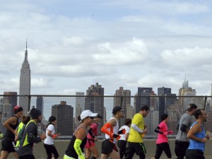 Runners cross the Pulaski Bridge from Brooklyn into Queens in New York, Nov. 3, 2013. (Craig Allen/The New York Times)