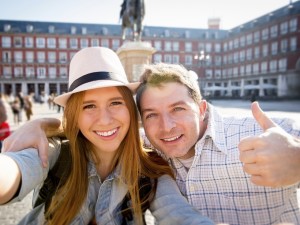 beautiful friends tourist couple visiting Europe in holidays stu