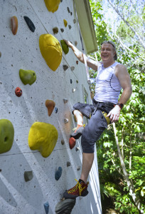 Dr. Adam Bright is a devotee of outdoor exercise. He thinks that exercising outdoors is better for your health and even has a climbing wall at home.  (STAFF PHOTO / THOMAS BENDER)